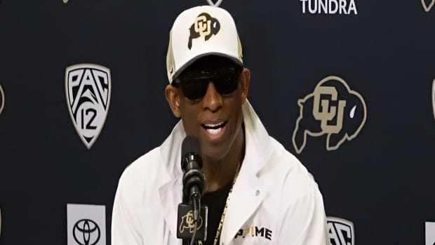 Deion Sanders at podium
